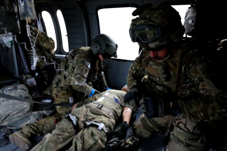 PRT Farah conducts medical evacuation training with Charlie Co., 2-211th Aviation Regiment at Forward Operating Base Farah 130109-N-IE116-316 photo