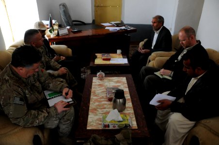 PRT Farah meets with Director of Repatriation and Refugees in Farah City 130122-N-LR347-015