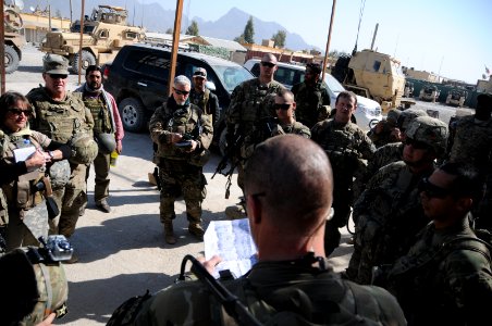 PRT Farah meets with Director of Repatriation and Refugees in Farah City 130122-N-LR347-405