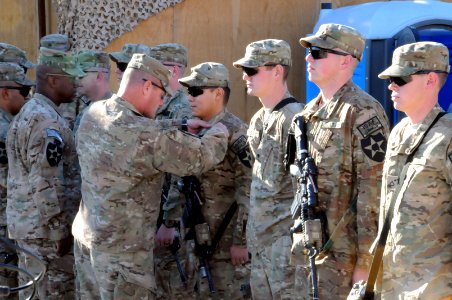 PRT Farah Security Force soldiers awarded Combat Action Badge and Combat Medical Badge 121219-N-LR347-456