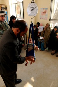 PRT Farah visits children's supplemental feeding center at Farah City hospital 121222-N-LR347-123