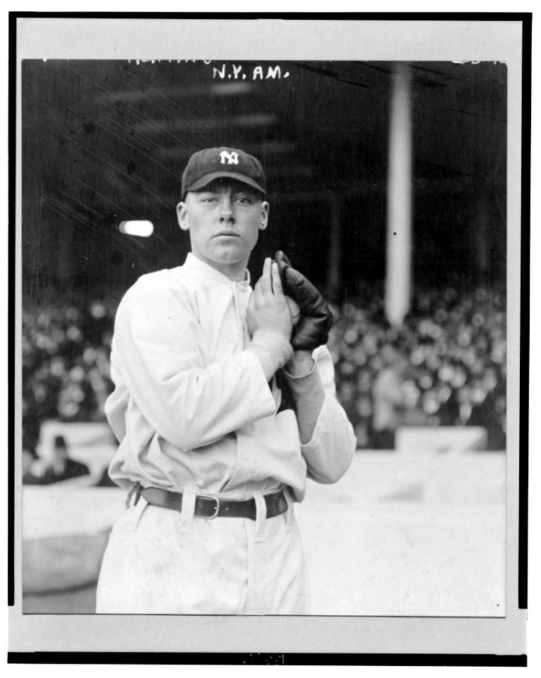 Ray Keating, New York Yankees pitcher, facing front, standing, holding a ball in his glove LCCN2004666451