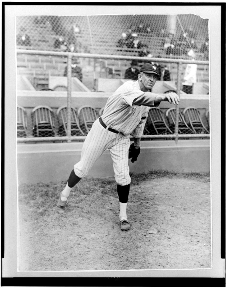 Raymond Benjamin Caldwell, Yankee pitcher, full-length portrait, facing right, with right arm extended outward after throwing baseball LCCN95519889