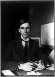 Raymond W. Pullman, half-length portrait, seated behind desk, facing front LCCN2005685032
