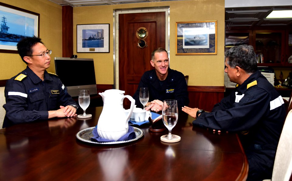 Rear Adm. Bill Byrne, Japan Maritime Self-Defense Rear Admiral Yoshihiro Goka, and Indian navy Rear Admiral Biswajit Dasgupta talk at the conclusion of Exercise Malabar 2017
