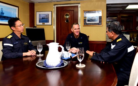 Rear Adm. Bill Byrne, Japan Maritime Self-Defense Rear Admiral Yoshihiro Goka, and Indian navy Rear Admiral Biswajit Dasgupta talk at the conclusion of Exercise Malabar 2017