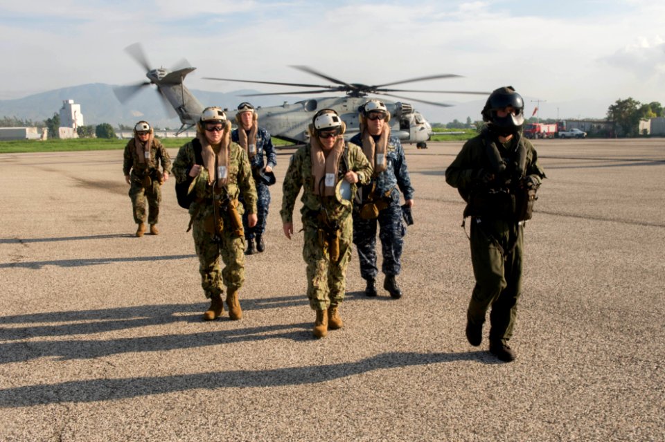 Rear Adm. Roy I. Kitchener, commanding officer of Expeditionary Strike Group TWO, exits a CH-53E Sea Dragon