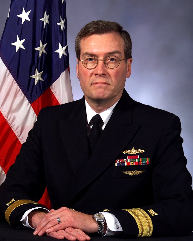 Rear Adm. (lower half) Robert E. Cowley