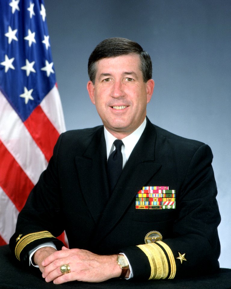 Rear Adm. (upper half) Paul G. Gaffney II, USN