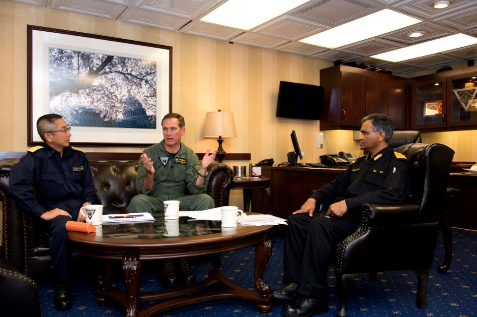 Rear Adm. Marcus Hitchcock speaks with JMSDF Rear Adm. Koji Manabe, and Indian Navy Rear Adm. S.V. Bhokare, flag officer commanding Eastern Fleet, after the conclusion of Malabar 2016 aboard USS John C. Stennis (CVN 74)