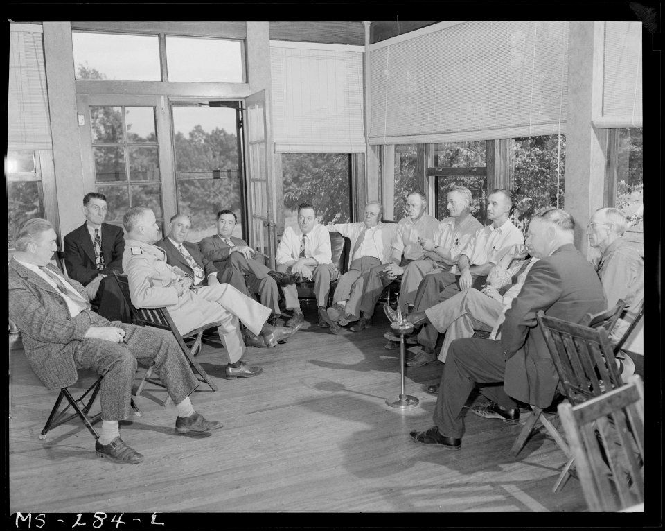 Rear Admiral Joel T. Boone, head of Medical Survey Group of Coal Mines Administration talks to local mine operators... - NARA - 540341