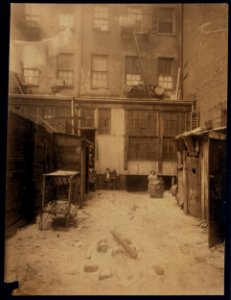 Rear view of tenement, 134 1-2 Thompson Street, New York City. See Photos of flower makers working here (2778 and 2816). LOC cph.3b47425