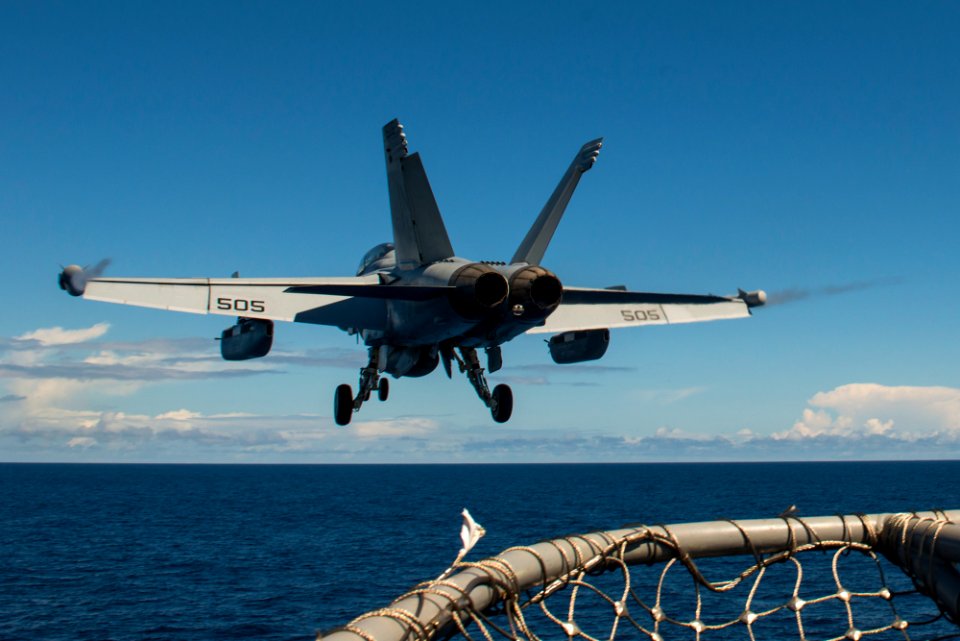 Rear view of VAQ-142 EA-18G Grower launching from USS Carl Vinson (CVN-70) 160506-N-TP834-041