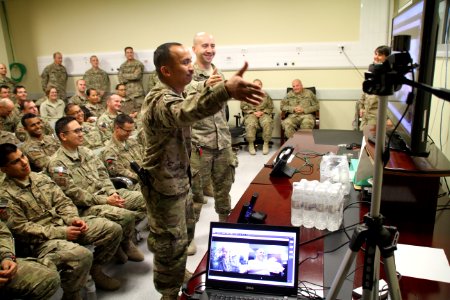 Reaching out to Afghanistan, A virtual handshake from the Pentagon 141218-N-JY715-651 photo