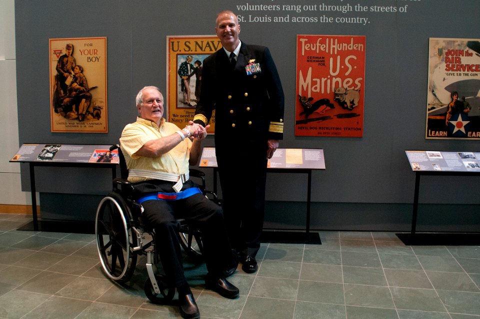 Rear Adm. Bret Muilenburg and Retired Capt. Jim Shelton pose for a photo during a ceremony (34117747966)