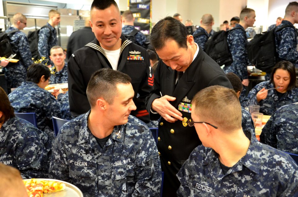 Recruits look at a Japan Maritime Self-Defense Force uniform (8560375486)
