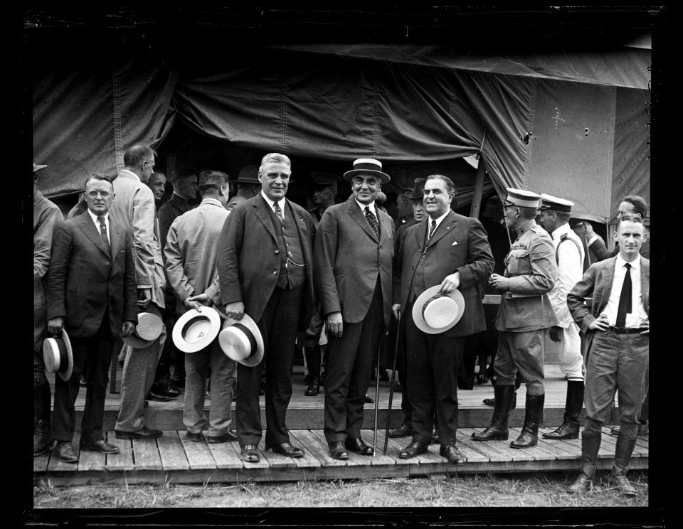 Reenactment of Pickett's Charge at the battle of Gettysburg in Pennsylvania. William Sproul, Warren Harding and Elbert Lee Trinkle in front of tent LCCN2016891527
