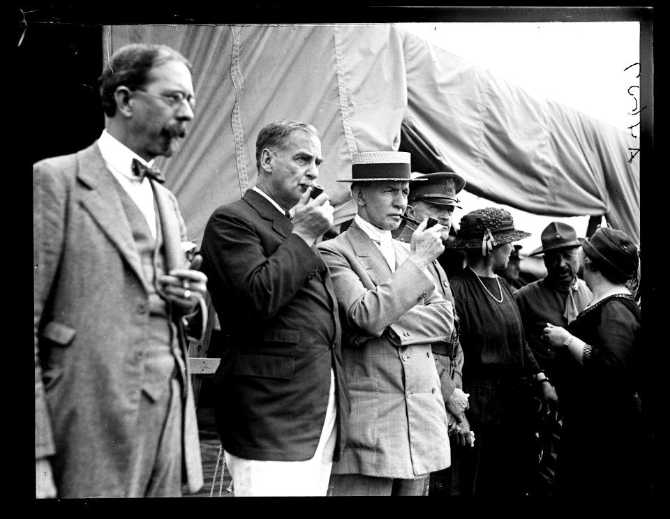 Reenactment of Pickett's Charge at the battle of Gettysburg, Pennsylvania. At center- Senator George Wharton Pepper, Charles Dawes, and General John J. Pershing LCCN2016891538