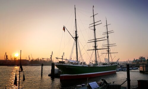 Sunset sailing vessel frigate