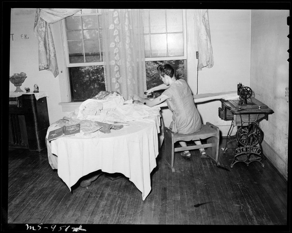 Relative of A. J. Donaldson, miner, helps with the laundry. Tennessee Coal, Iron & R.R. Company, Edgewater Mine... - NARA - 540623