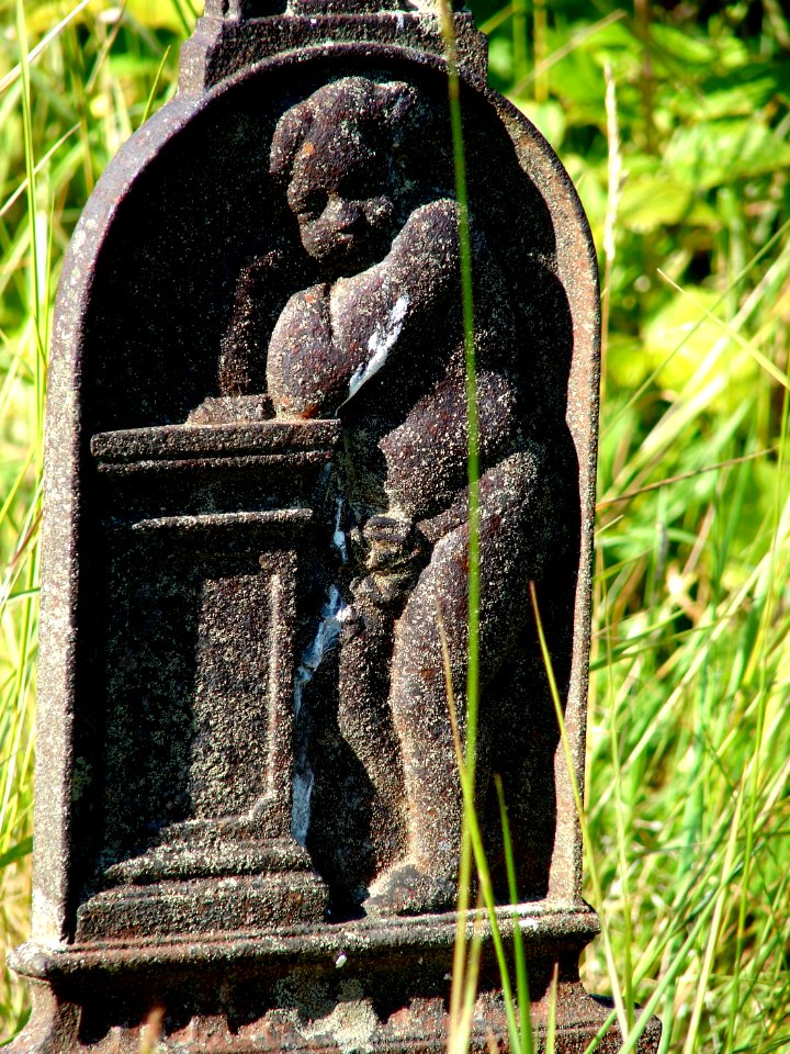 Relief på gravminde (Mo kirke)