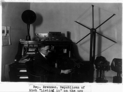 Rep. Vincent Morrison Brennan, Republican of Michigan, listening in on the proceedings of the House, with a receiving set LCCN2002695664