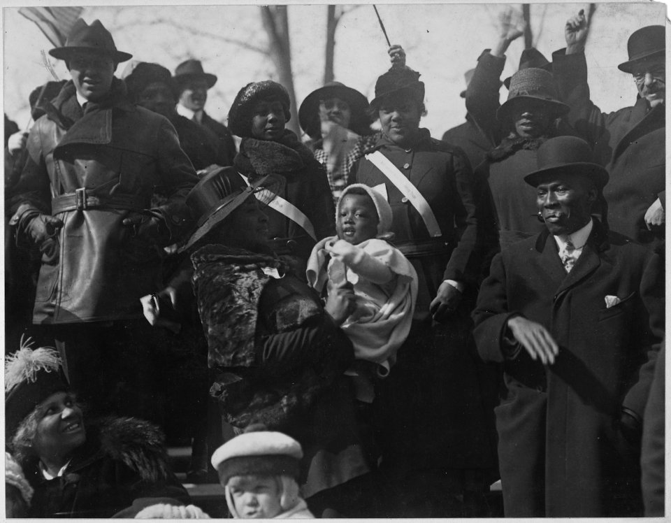 Relatives and friends cheering the 369th Infantry as they pass in parade. New York City's (African . . . - NARA - 533513