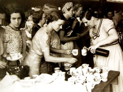 Residents of Penang at Ipoh Station, Perak having refreshments from local residents, WWII (23916855204)