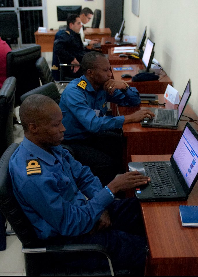 Republic of Sierra Leone Armed Forces Lt. Cmdr. Lawrence Jabati and Ghana Navy Lt. Cmdr. David Kpetigo participate in Saharan Express 2014 in Dakar, Senegal, March 10, 2014 140310-N-QY759-039