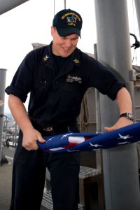 Retiring U.S. Navy Captain's flag is flown aboard USS Bonhomme Richard 170112-N-XT039-178