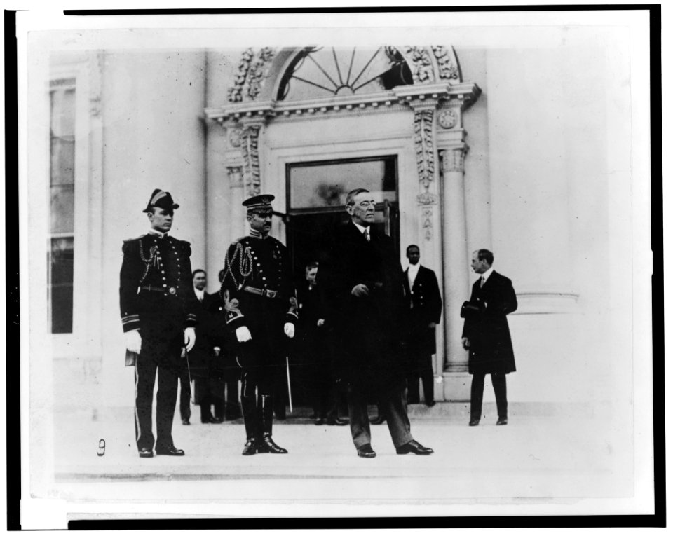 Return to White House with his military and naval aide LCCN2002713175