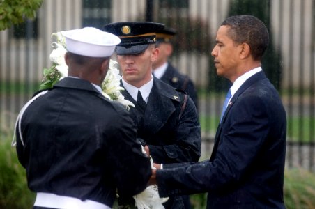 Resident Barack Obama lays a wreath during a remembrance event at the Pentagon Memorial Sept. 11, 2009 photo
