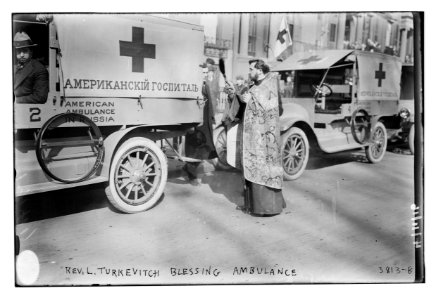 Rev. L. Turkevitch blessing ambulance LCCN2014701380