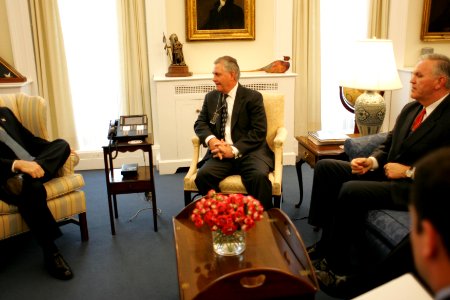 Rex Tillerson talks with Vice President Dick Cheney