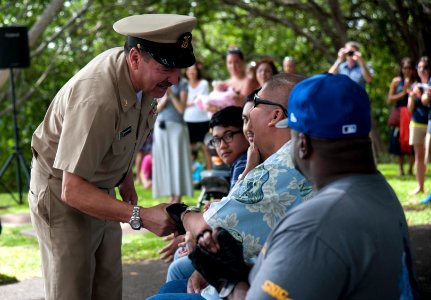 Retired Navy veteran made honorary chief 150308-N-WC566-049