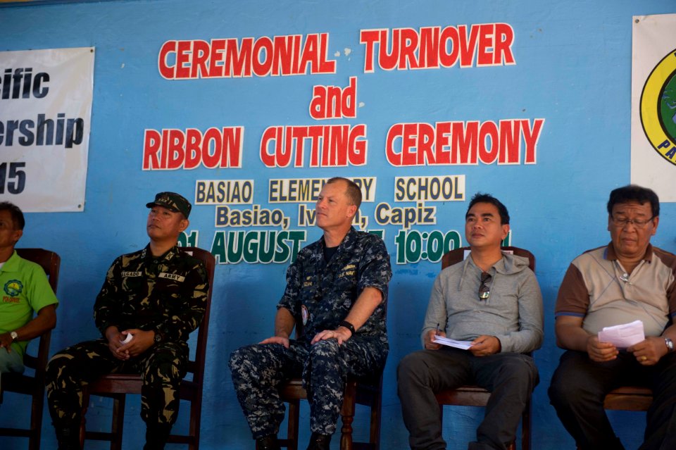 Ribbon cutting ceremony at Basiao Elementary School in the Philippines during Pacific Partnership 2015 150801-N-UQ938-132