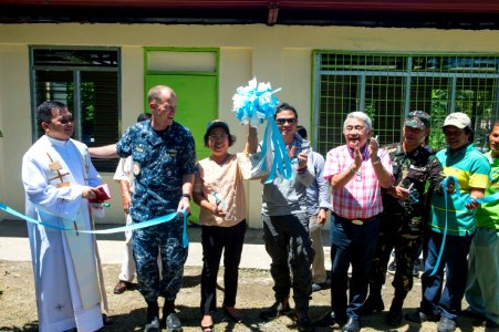 Ribbon cutting ceremony at Basiao Elementary School in the Philippines during Pacific Partnership 2015 150801-N-UQ938-242
