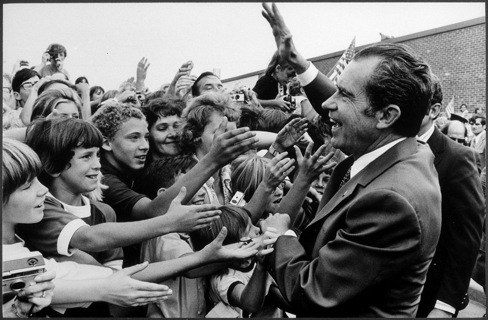 Richard M. Nixon being greeted by school children during a campaign stop. - NARA - 194445