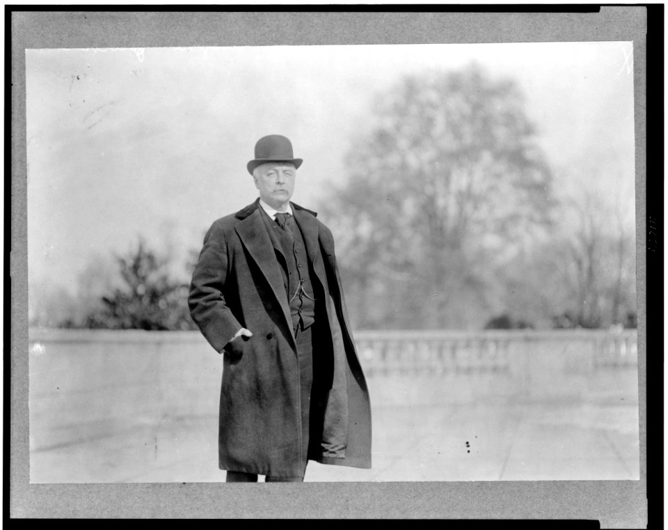 Richard Wayne Parker, three-quarter length portrait, standing, facing slightly right, wearing overcoat and hat LCCN94507648