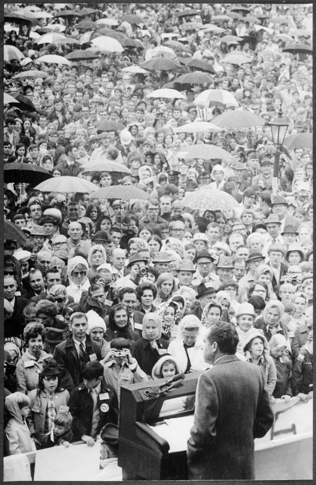 Richard M. Nixon speaking to crowd in the rain - NARA - 194691
