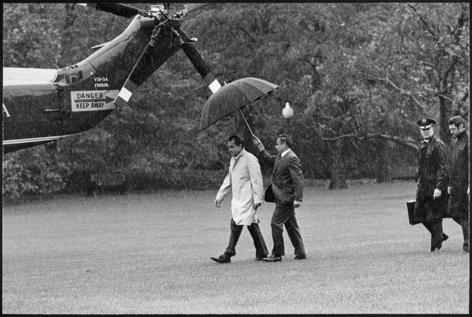Richard M. Nixon walking out to Marine One in the rain - NARA - 194697