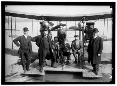 RICHARDSON TANDEM BIPLANE HYDROPLANE ON POTOMAC, APRIL, 1916. GEORGE A. GRAY AT CONTROLS. AT LEFT AND RIGHT ARE RICHARDSON BROTHERS WHO BUILT THE PLANE; 2ND FROM LEFT IS THEIR UNCLE, WHOSE LCCN2016867216