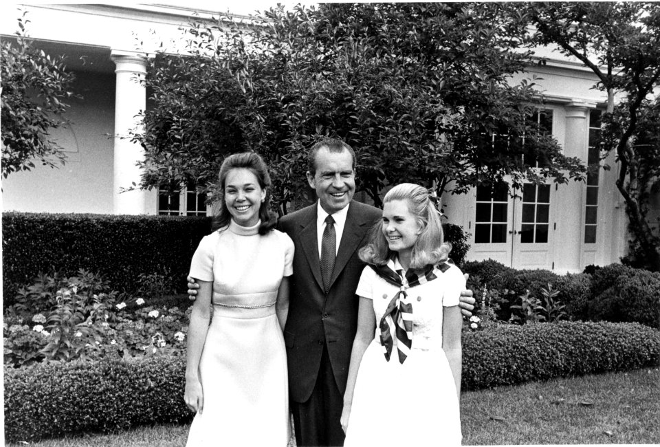 Richard Nixon with his daughters
