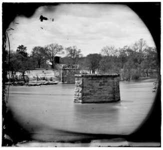 Richmond, Va. Ruins of Richmond & Danville Railroad bridge; the city beyond LOC cwpb.01248