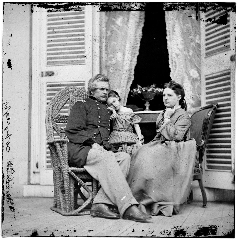 Richmond, Virginia. Gen. Edward O.C. Ord, wife and child at the residence of Jefferson Davis. In the doorway is the table on which the surrender of Gen. Robert E. Lee was signed LOC cwpb.02929
