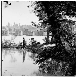 Richmond, Virginia. View of burned district and ruins of Mayo's bridge from across the James River LOC cwpb.02732