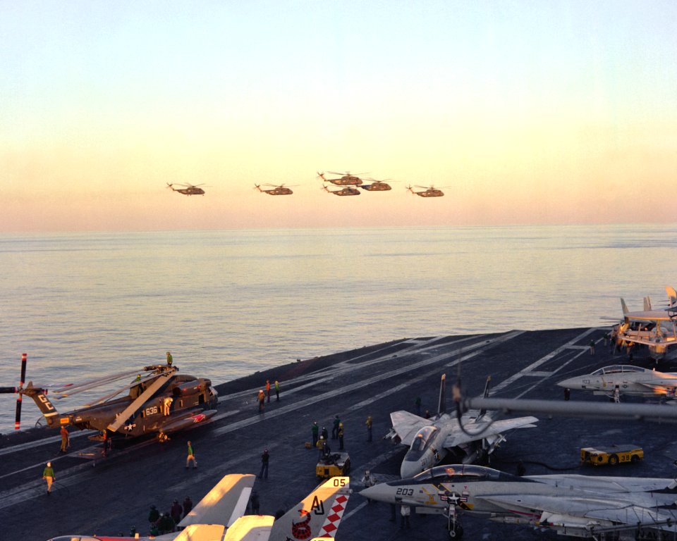 RH-53Ds fly over USS Nimitz April 1980