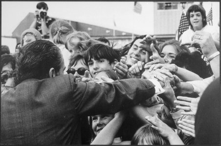 Richard M. Nixon being greeted by people at an airport in Bangor, Maine. - NARA - 194730
