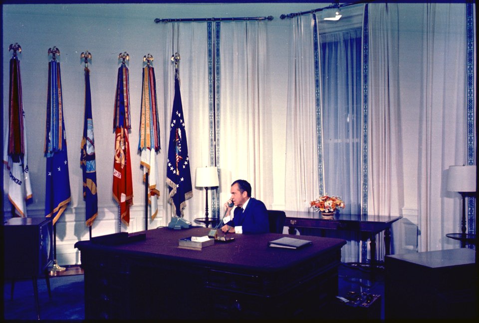 Richard M. Nixon on the phone in the oval office talking to Astronaunts on the moon. - NARA - 194648