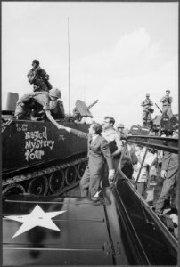 Richard M. Nixon shaking hands with armed forces in Vietnam - NARA - 194650